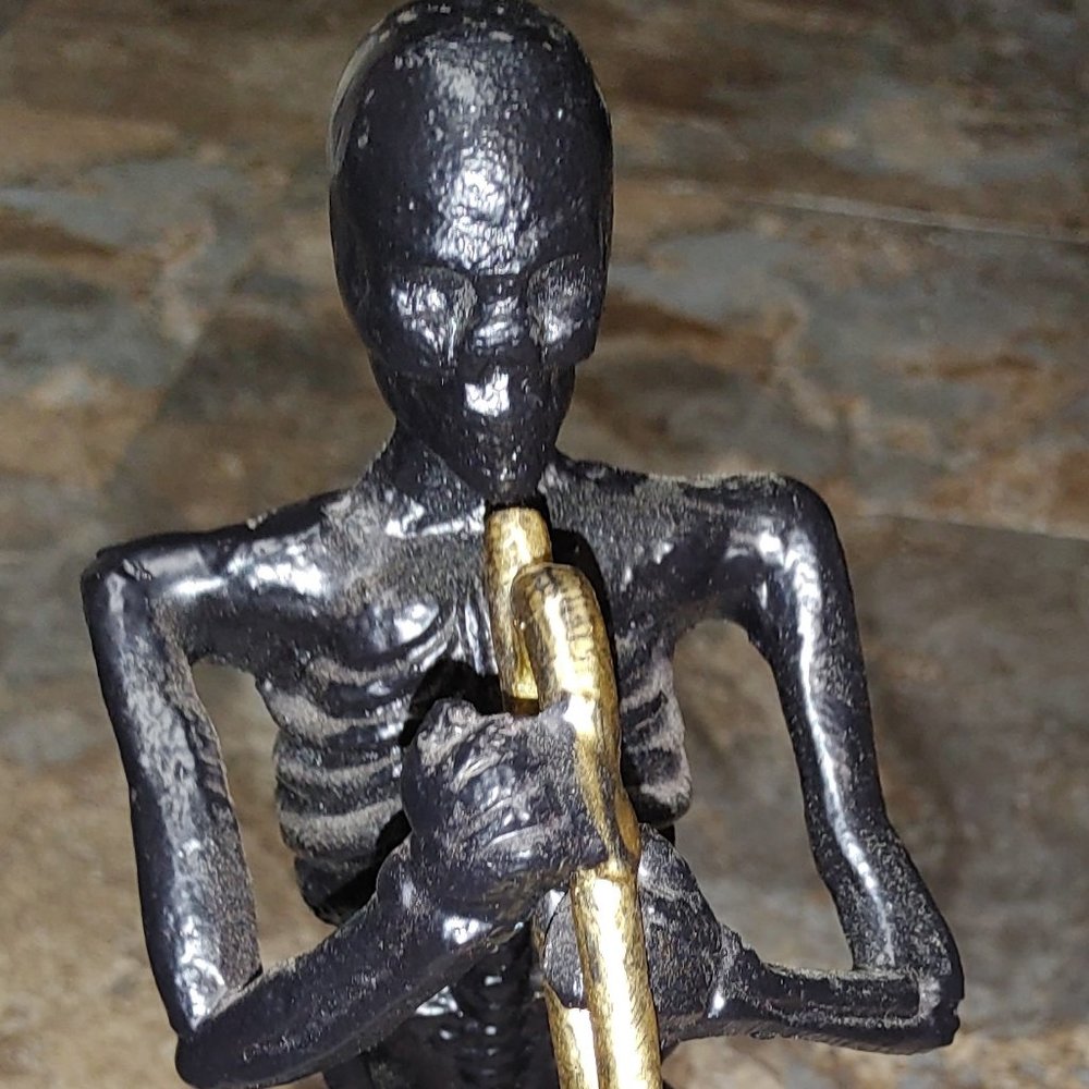 Iron Skeleton Playing Trombone
